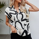 Blusa Casual Verão – Manga Morcego, Decote em V e Estampado Elegante