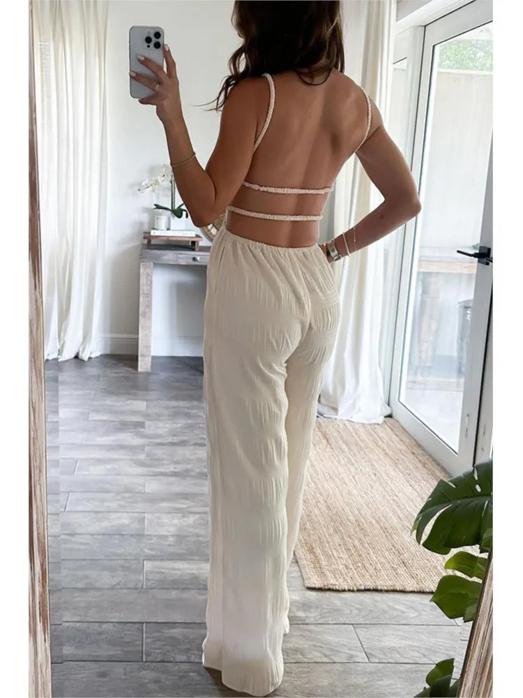 Elegant Women's Sleeveless Jumpsuit – Thin Straps, Open Back and Wide Leg 