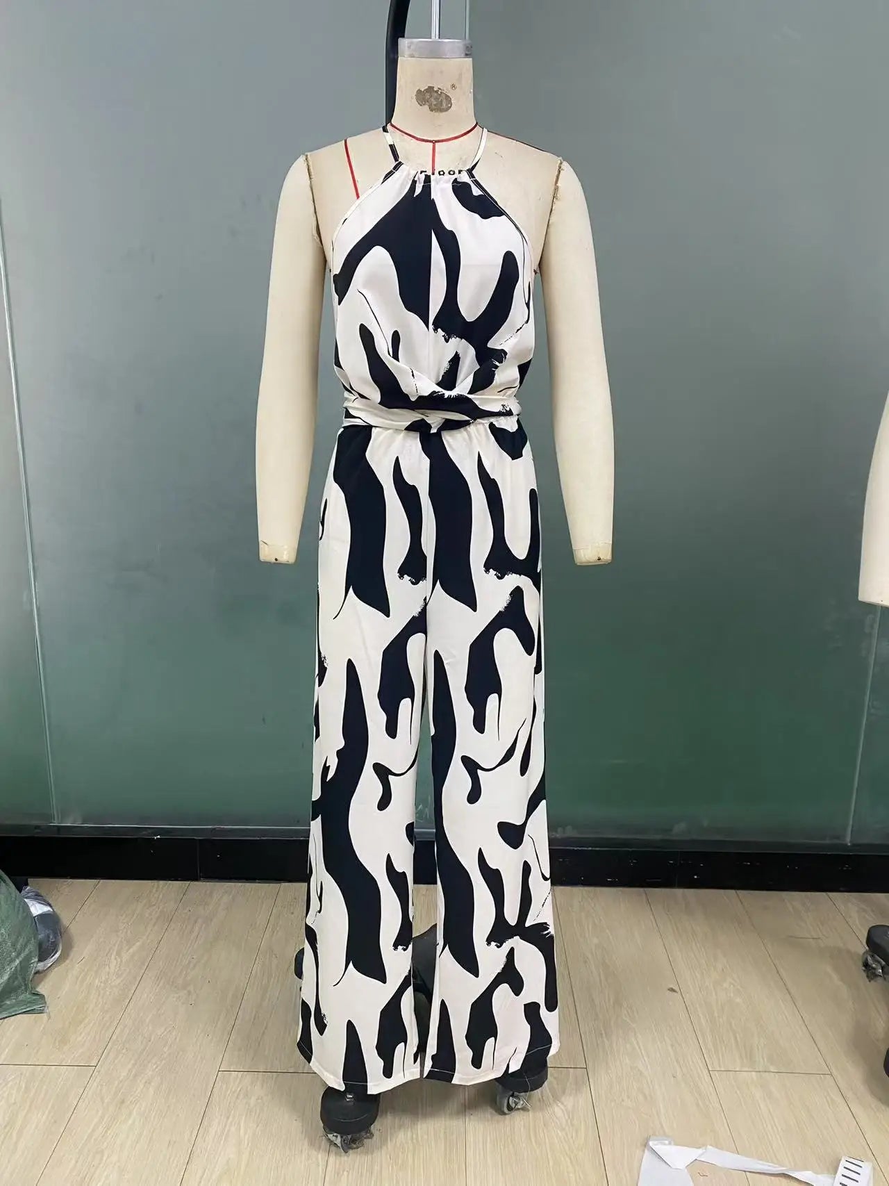 Women's Long Jumpsuit with Halter Neckline – Printed, Sleeveless, High Waist with Bow and Wide Leg Pants 