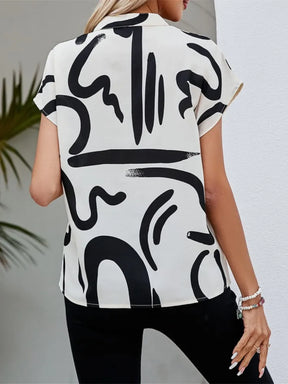 Blusa Casual Verão – Manga Morcego, Decote em V e Estampado Elegante