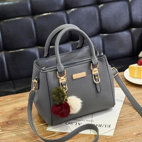 Mala Tiracolo Feminina de Luxo Gusure – Grande Capacidade com Pendente de Tassel e Bordado Elegante